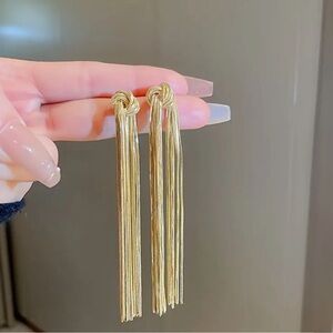 Gold Knotted Long Tassel Statement Earring